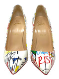 A pair of Christian Louboutin Paris pointed-toe pumps featuring a white base covered in colorful graffiti-style paint splatters and red signature Louboutin soles, shown against a plain white background.