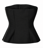 A black Dior structured corset-style top with a wide waistband, fitted center, and flared peplum-like bottom, shown on a plain white background.
