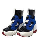 A pair of Margiela x Reebook high-top platform sneakers featuring a bold color-blocked design of royal blue, black, and white, with red accents on the toe caps and sole, set against a plain white background.