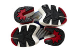 Reebok x Margiela sole view, featuring a black and red star-shaped tread pattern, white midsoles, and a textured blue and white footbed.
