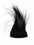 A black knit beanie hat with long, wispy black hair-like extensions rising from the top, shown on a plain white background.