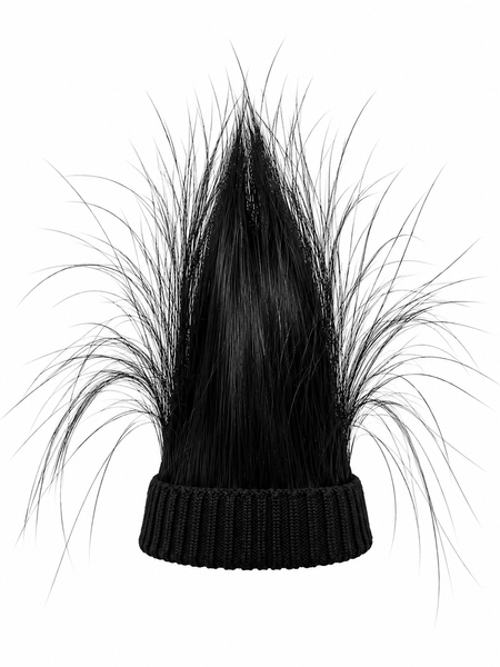 A black knit hat featuring a tall, pointed top covered in long, wispy black hair or faux fur, photographed against a plain white background.