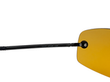 Close-up of a black metal temple arm and a yellow-tinted shield lens on a plain white background.