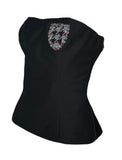 A Dior black strapless corset-style top with a decorative multicolor beaded crest on the upper back, shown against a plain white background.