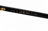 Close-up of a black sunglasses arm with gold printed specifications and a gold temple tip, shown on a plain white background.